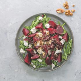 Salad with leaves, walnuts, Greek-style cheese and beetroot